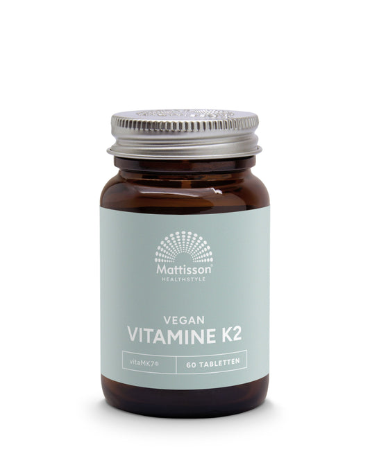 Mattisson Vitamin K2 200mcg MK7 supplement in a bottle with 60 tablets, showing the product label and tablets inside.