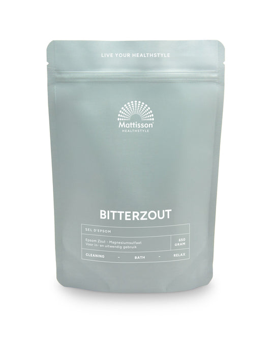 Mattisson Bitterzout epsom zout magnesiumsulfaat 650g, herbal mineral salt in a clear container, used for baths and relaxation.