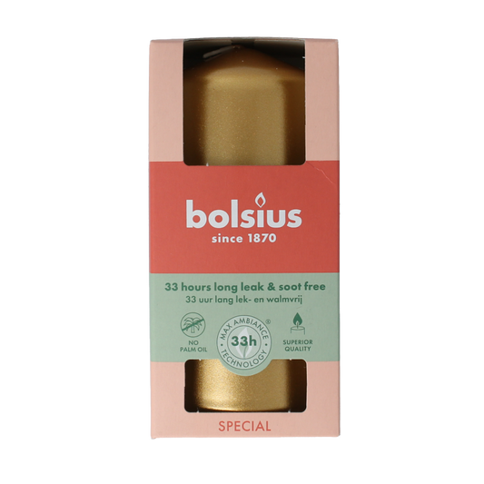 Golden orange Bolsius Stompkaars candle measuring 120/58, displayed in a natural setting with a warm glow.