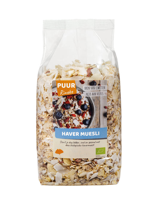 Puur Rineke bio muesli ontbijtgranen in 750g package, with mixed grains and nuts, shown in a natural setting.