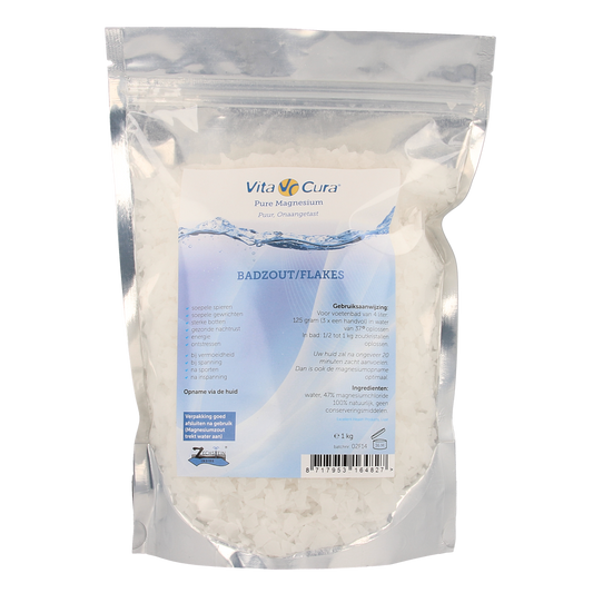 Vitacura magnesium salt flakes in a 1kg bag, used for bath and shower purposes, with a clear view of the product packaging.
