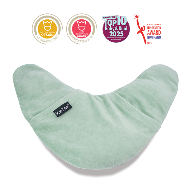 KipKep Lexie heating pillow in pale green, a soft cushion designed for warmth and comfort, shown in the product image.