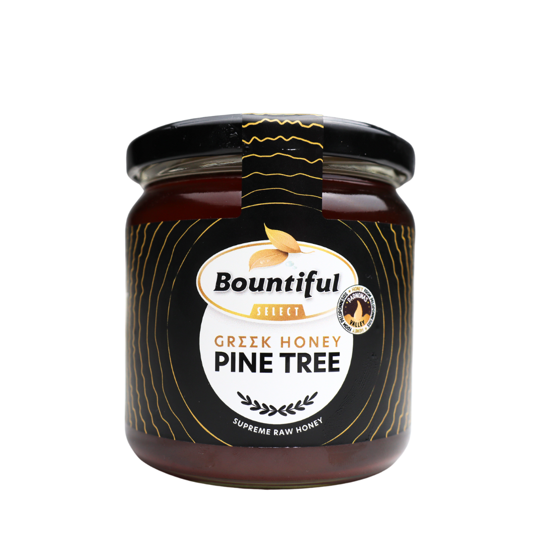 Bountiful Select Griekse raw pine tree honey in a 500g jar, showcasing golden honey with pine tree flavor.