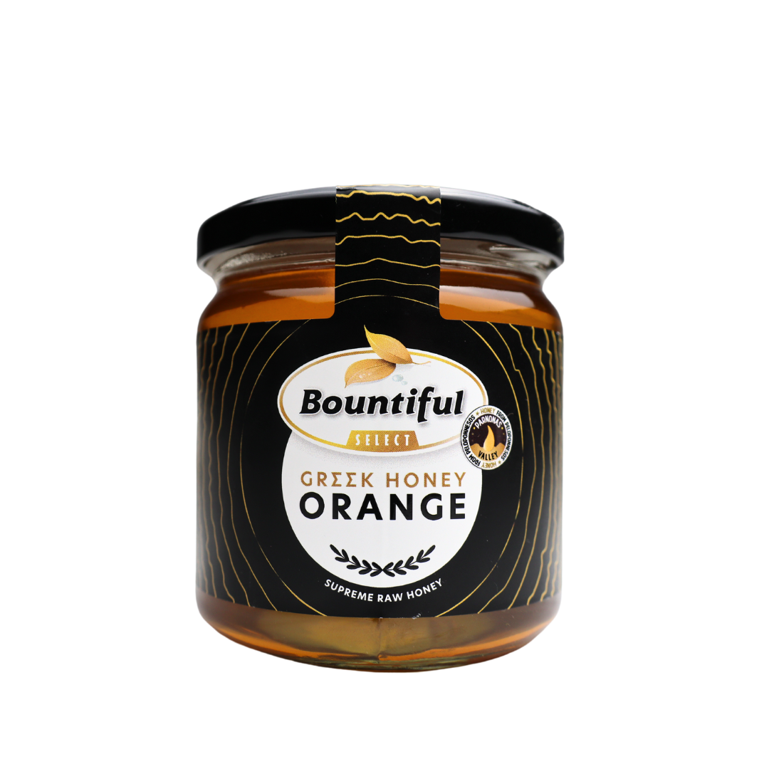 Bountiful Select Griekse rauwe honing met sinaasappel, 500g jar, viscous orange-flavored honey with natural texture