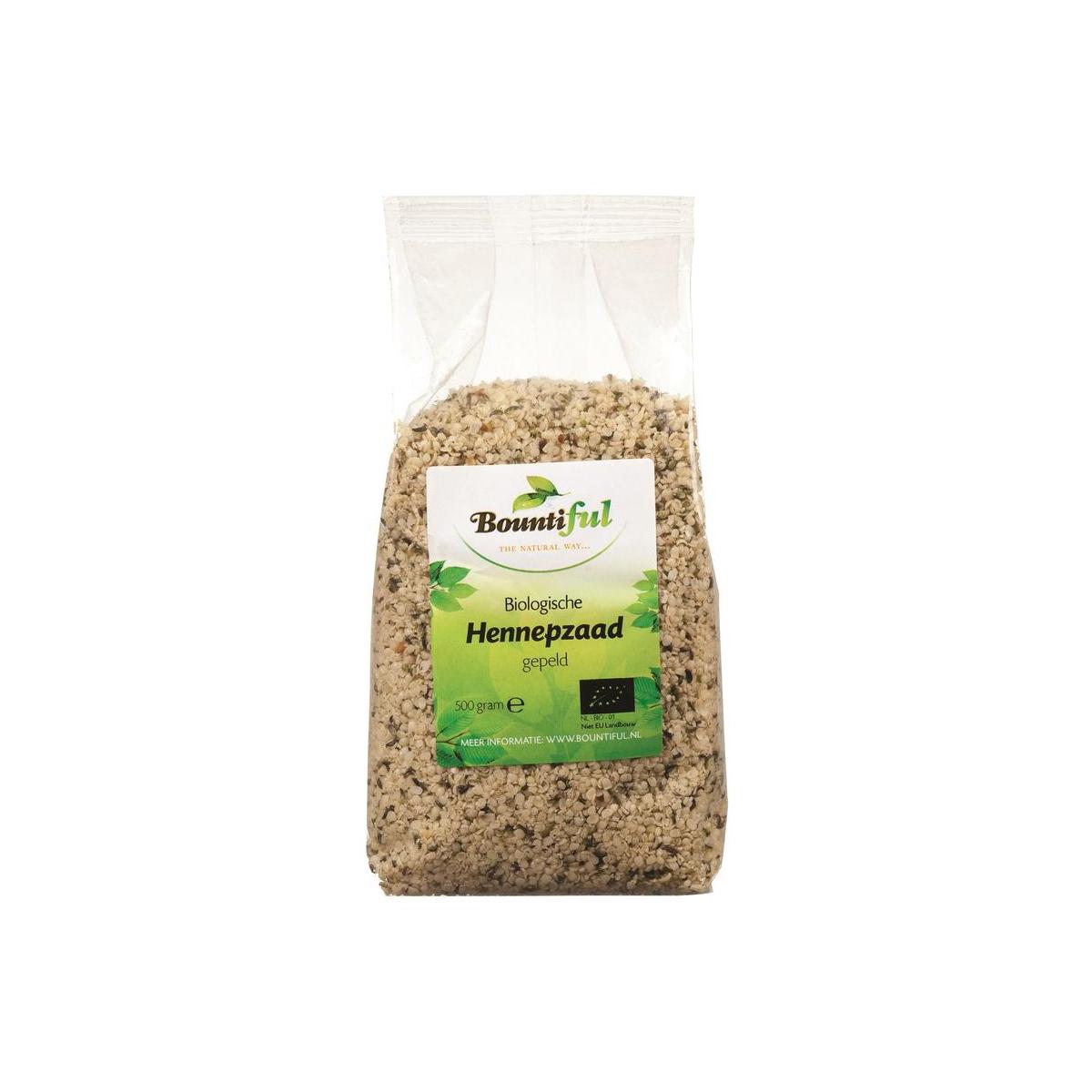 Bountiful organic hemp seeds in a 500g package, raw superfood product, close-up of green hemp seeds in a clear container.