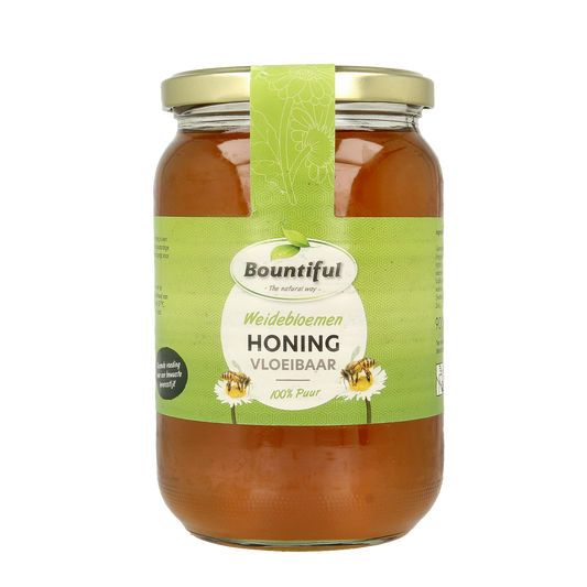 Bountiful Weidebloemen honing in a 900g jar, showcasing golden liquid honey from flower meadows, produced by Bountiful.