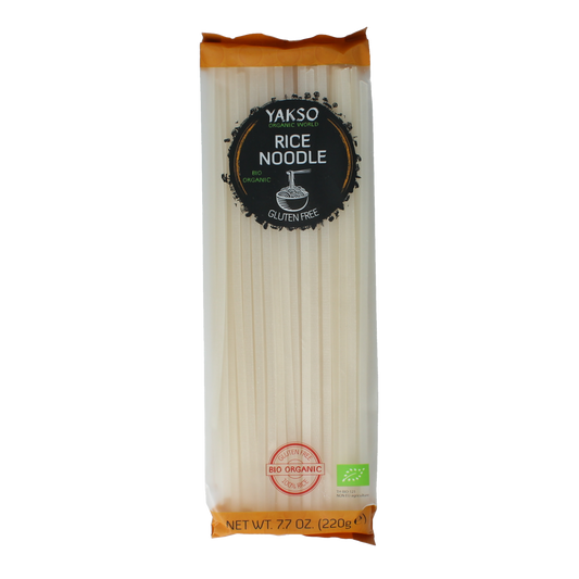 Yakso organic rice noodles in a 220g package, showcasing the pasta's thin, white rice noodle strands on the package.