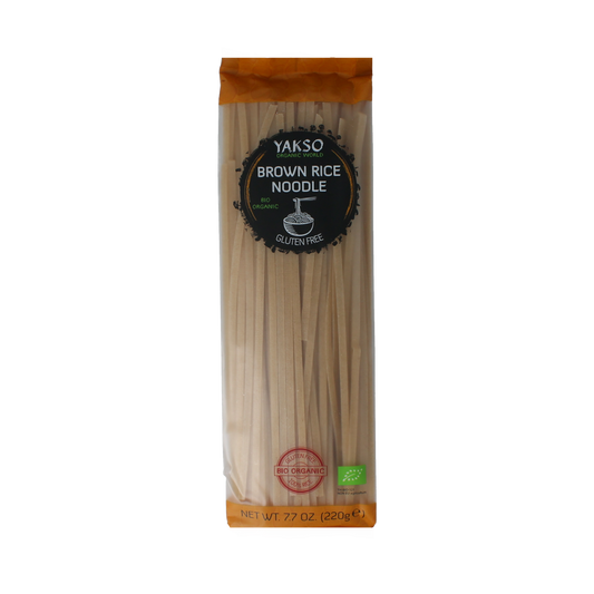 Yakso Rice Noodle Bruin Bio, 220g, natural pasta made from organic rice, shown in a close-up of the packaged product.