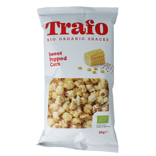 Trafo bio sweet popcorn in a 50g packet, showing golden caramel-coated kernels in a clear bag.