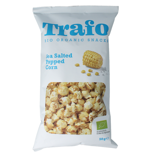 Trafo Popcorn zout bio 50g, organic salted popcorn snack in a clear bag, featuring crunchy popcorn with sea salt.