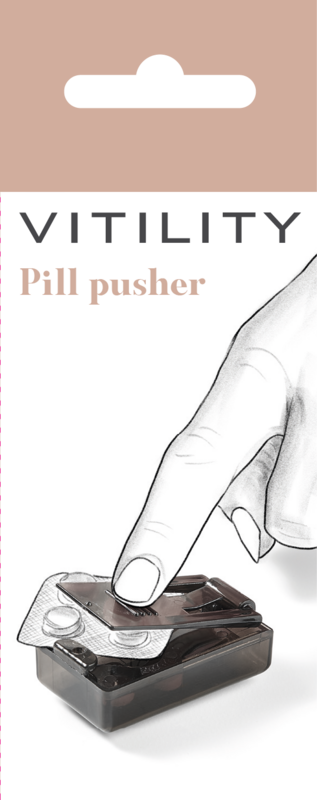 Vitility tablet press instrument with a compact, handheld design and metal pressing surface for pill shaping.