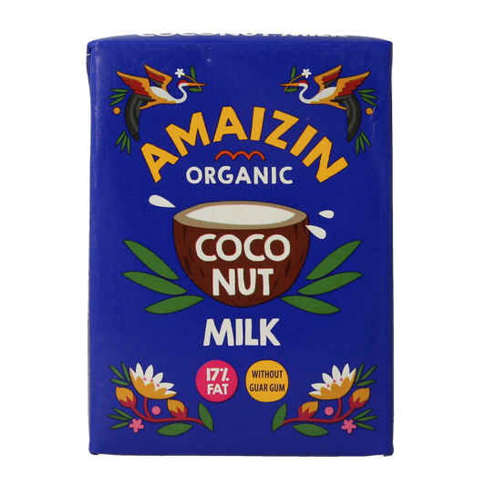 Organic Amaizin coconut milk in a 500ml bottle, used as a sauce or flavoring, shown in a natural setting.