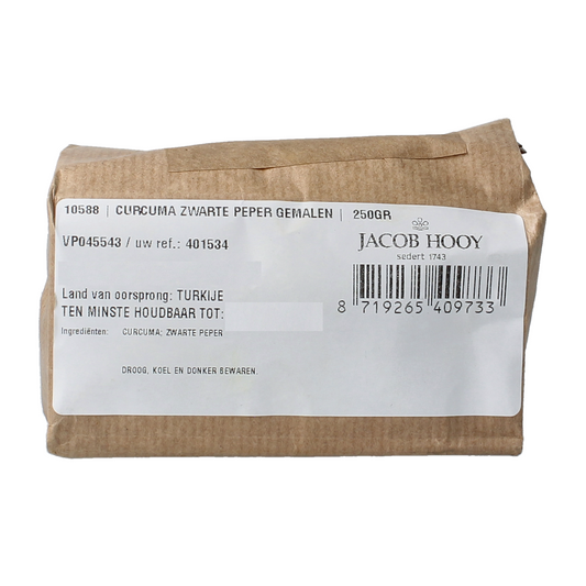 Ground Jacob Hooy turmeric and black pepper spice mix in a 250g container. Natural ingredients for cooking and flavoring.