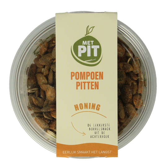 Close-up of Met PIT pumpkin seeds with honey in a bowl, highlighting crunchy snack and natural flavor.