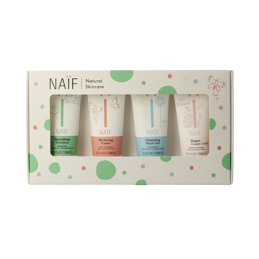 Naif Baby & Kids Mini Set with four 15ml bottles of gentle baby care products in colorful packaging.