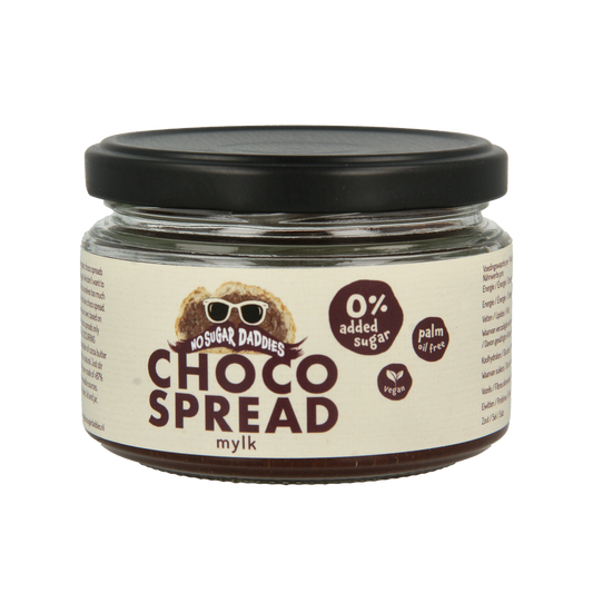 No Sugar Daddies Chocopasta mylk bio spread on bread, showing smooth, chocolate-flavored spread in a jar with a spoon.