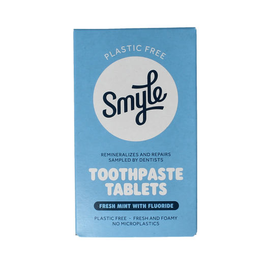 Smyle fluoride toothpaste tablets refill pack with 63 tablets, shown in a close-up image of the packaging.