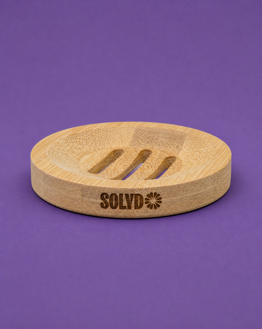 Solyd bamboo holder for personal care, single unit, eco-friendly design, natural bamboo finish, ideal for bathroom or vanity use.