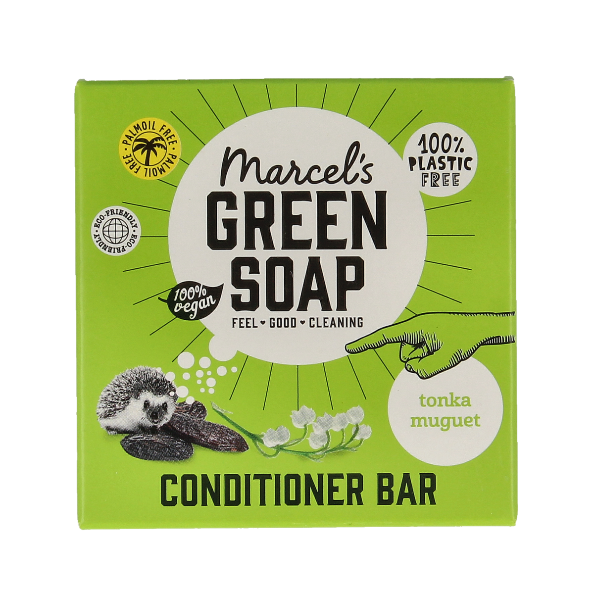 Marcel's Green Soap conditioner bar with tonka and muguet, 60g, for hair care, shown in a natural setting with the product packaging.