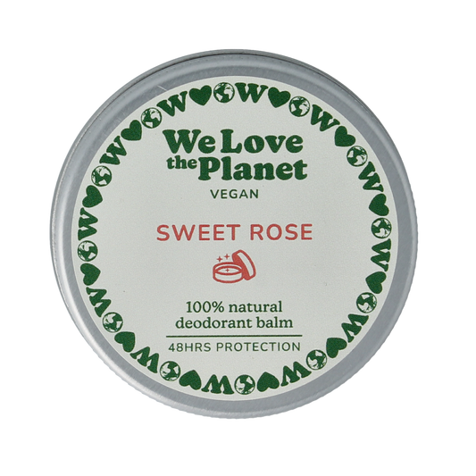We Love The Planet vegan Sweet Rose deodorant balm in a 35g container showing the floral packaging and product label.