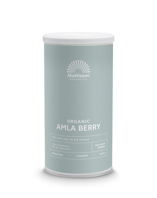 Organic amla berry powder by Mattisson, 220g, showcasing the bright yellow powder in a natural setting.