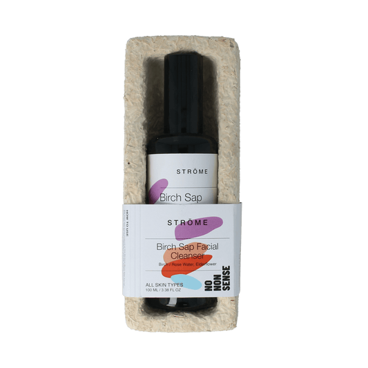 Ströme Birch Sap Facial Cleanser in 100ml bottle showing the clear liquid and minimalist packaging for natural skincare.