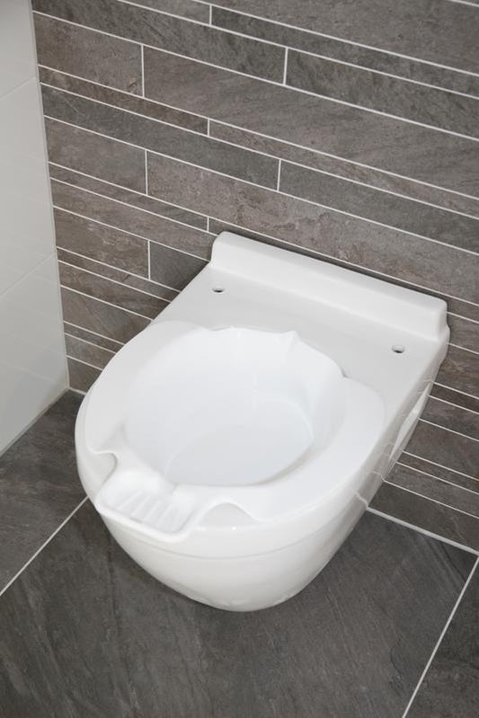 Able 2 bidet attachment in durable plastic for bathroom and toilet use, shown installed on a toilet bowl.