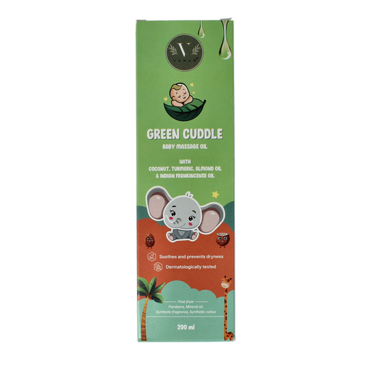 Vanan Green cuddle baby massage oil bottle, 200ml, in a natural setting, ideal for baby and toddler skin care.