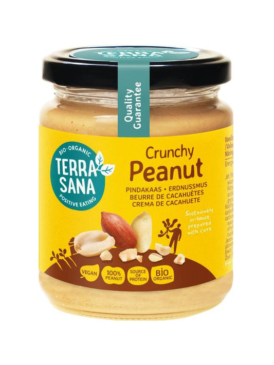 Crunchy organic TerraSana peanut butter spread on bread, without salt, in a 250g jar.