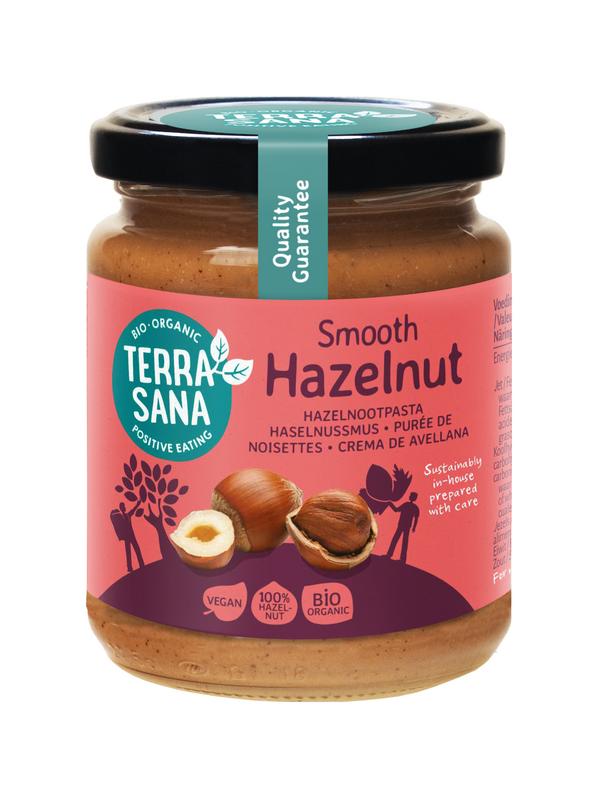 TerraSana Hazelnootpasta bio spread on bread, 250g jar, creamy hazelnut spread for breakfast or snacks.
