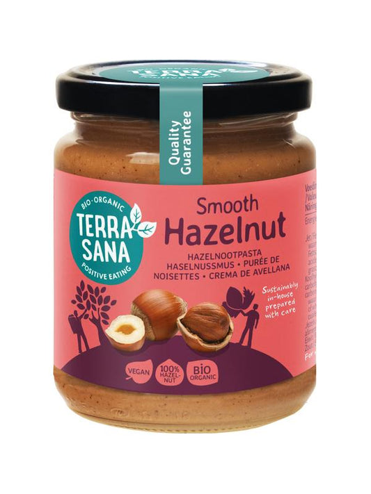 TerraSana Hazelnootpasta bio spread on bread, 250g jar, creamy hazelnut spread for breakfast or snacks.
