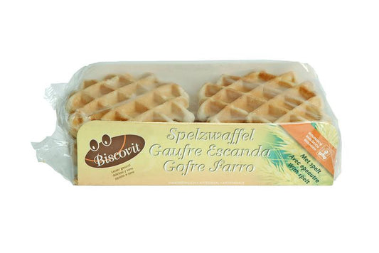 Biscovit Bio Spelt Wafers round koekje on a white plate, 150g packaging, natural and crunchy snack.