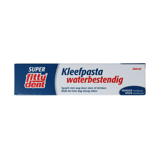 Close-up of Fittydent Kleefpasta tube for dental prostheses, showing the label and product packaging.