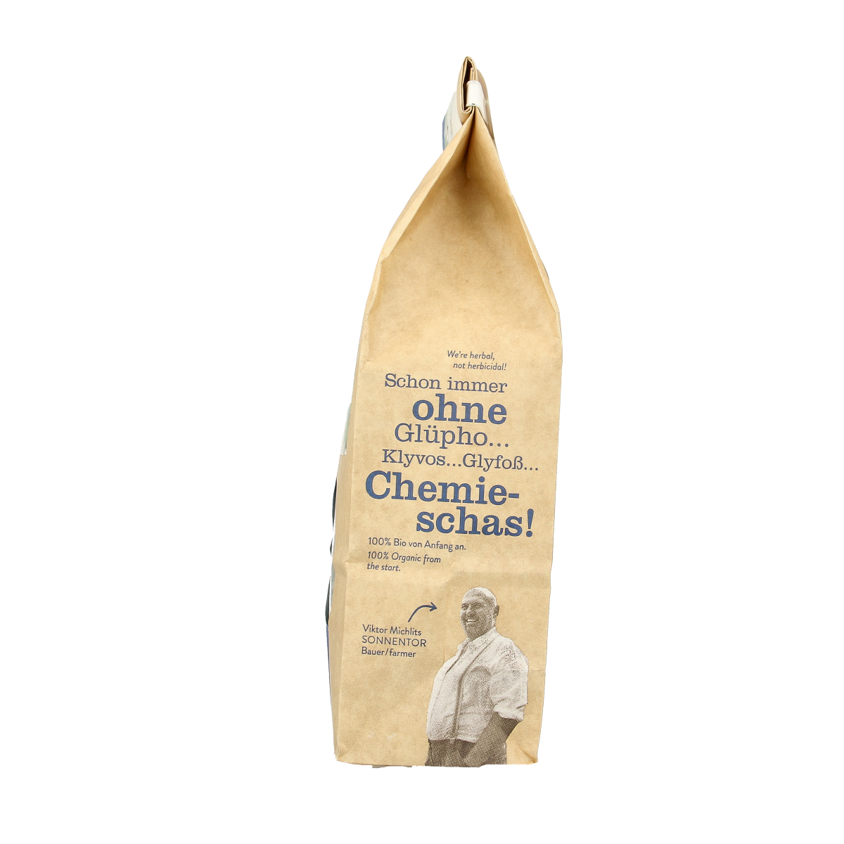 Organic Sonnentor Vrouwenmantel loose herbal tea in a clear container, showing dried herbal leaves and flowers.
