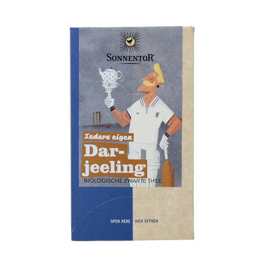 Organic Sonnentor Darjeeling tea, 18-pack, showcasing tea bags with packaging in a natural setting for coffee and tea lovers.