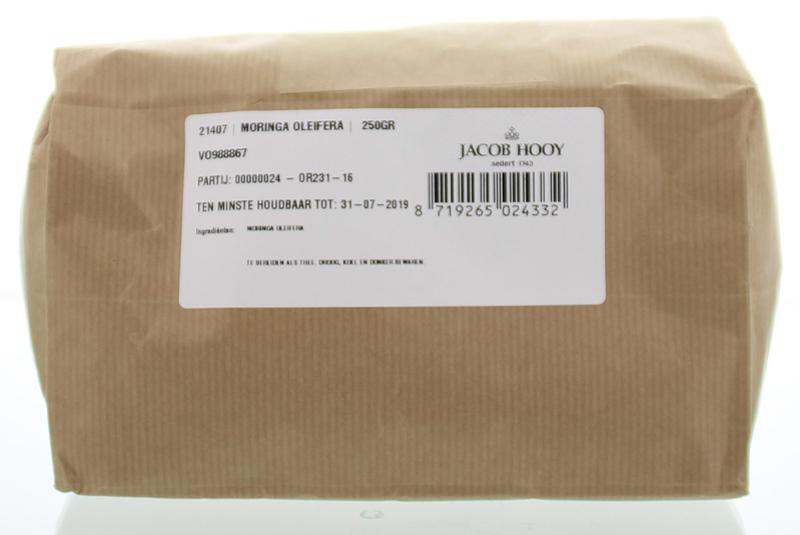 Sliced Jacob Hooy Moringa oleifera herbs in 250g package, used in cooking and herbal remedies.