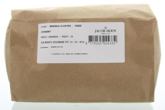 Sliced Jacob Hooy Moringa oleifera herbs in 250g package, used in cooking and herbal remedies.