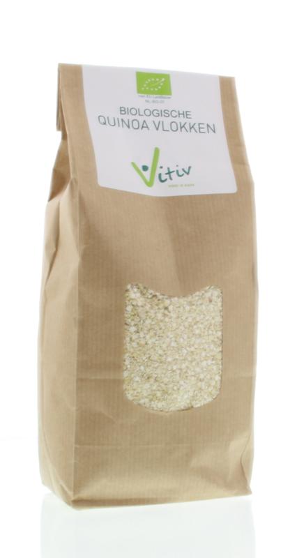 Vitiv bio quinoa flakes in a clear bowl, showcasing light, raw quinoa flakes on a neutral background for superfood nutrition.