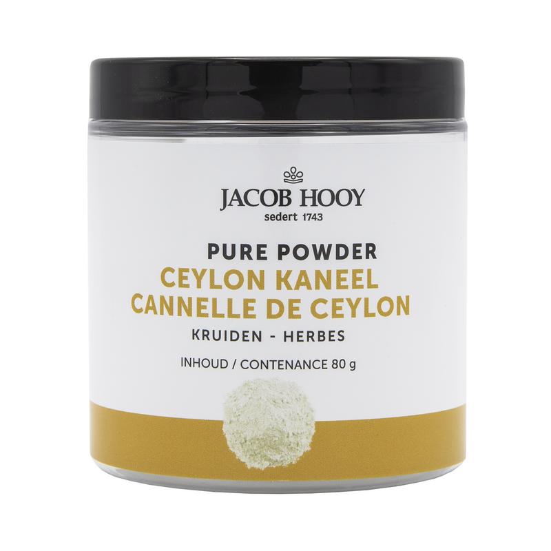 Jar of Jacob Hooy Ceylon cinnamon powder, 80g, in a clear glass container with a label, used as a spice and cooking ingredient.