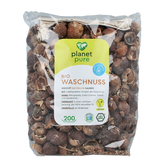 Planet Pure Zeepnoten natuurlijk wasmiddelen in 1 kg bag, showing organic soap nuts for eco-friendly laundry cleaning.