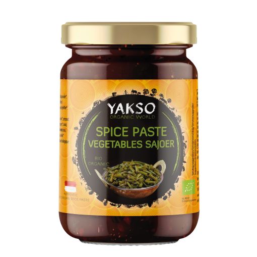 Yakso bio spice paste with vegetables for sajoer, 100g jar, showcasing the colorful sauce with herbs and spices.