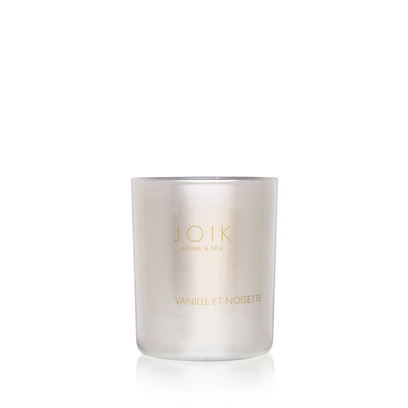 Joik Organics vegan vanilla and hazelnut scented candle in 150g glass jar, natural soy wax, cozy aroma, eco-friendly product.