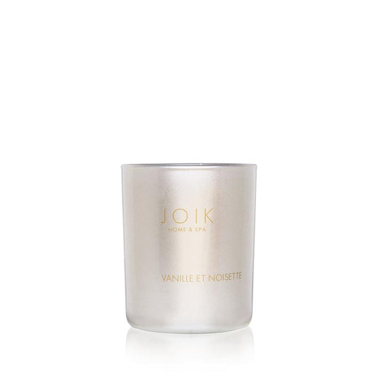 Joik Organics vegan vanilla and hazelnut scented candle in 150g glass jar, natural soy wax, cozy aroma, eco-friendly product.