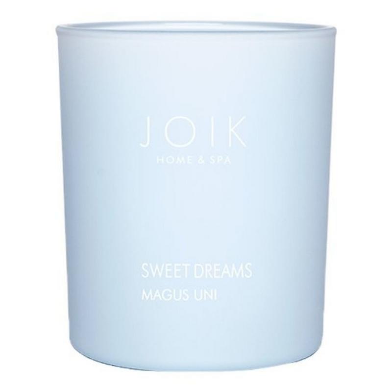 Joik Organics vegan scented candle with sweet dreams fragrance, 150g, showcasing a cozy candle in a natural setting.
