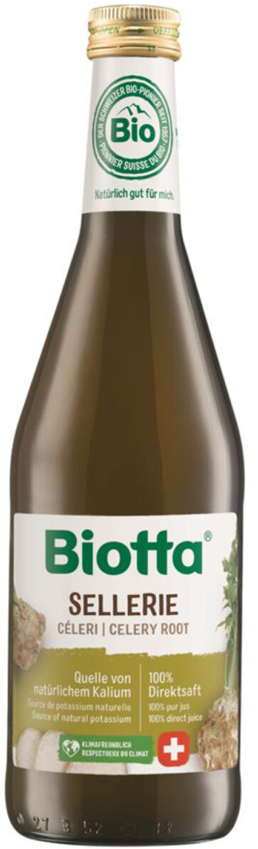 Biotta organic celery juice in a 500ml bottle, clear glass with fresh celery stalks inside, label visible on the front.