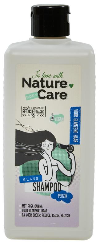 Nature Care Glans shampoo bottle, 500ml, for hair care with a sleek design and clear label, showcasing the product's packaging.