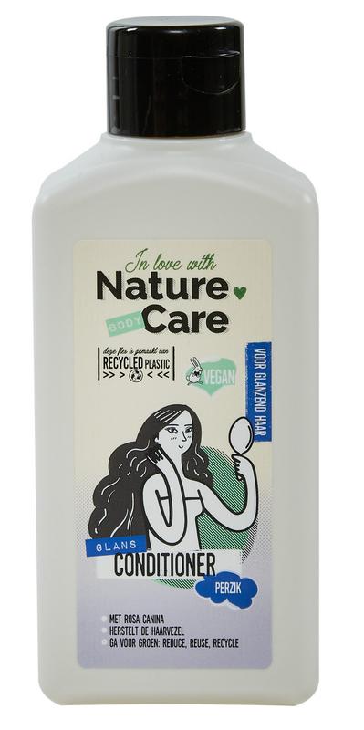 Nature Care Conditioner hair treatment bottle, 250ml, for healthy and shiny hair, in a sleek white and green design.