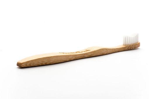 Soft bamboo toothbrush by The Humble Co for adults with white bristles, shown with a natural bamboo handle.