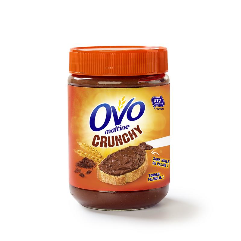 Ovomaltine Crunchy Cream spread on bread, 360g jar, creamy chocolate and malt flavor, Ovomaltine brand, breakfast spread or sandwich topping