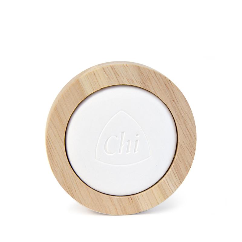 Chi Aromastone wood aroma diffuser stone, natural wood scent disperser, single piece with textured wood grain surface.